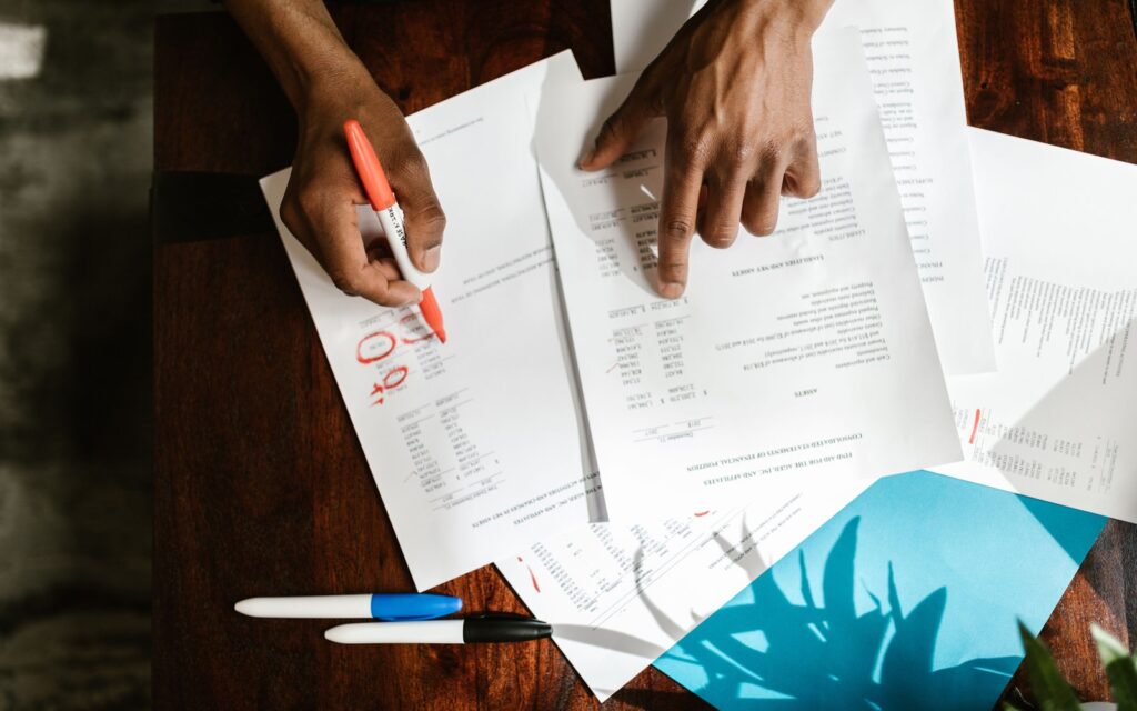 A one-page case study printout with the key number circled and the client quote highlighted