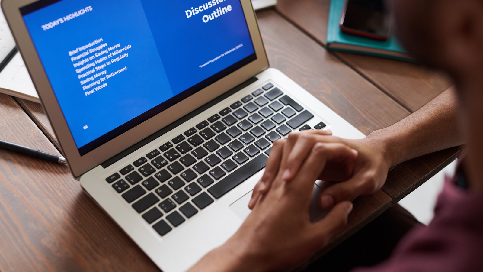 A laptop open to a busy online discussion thread