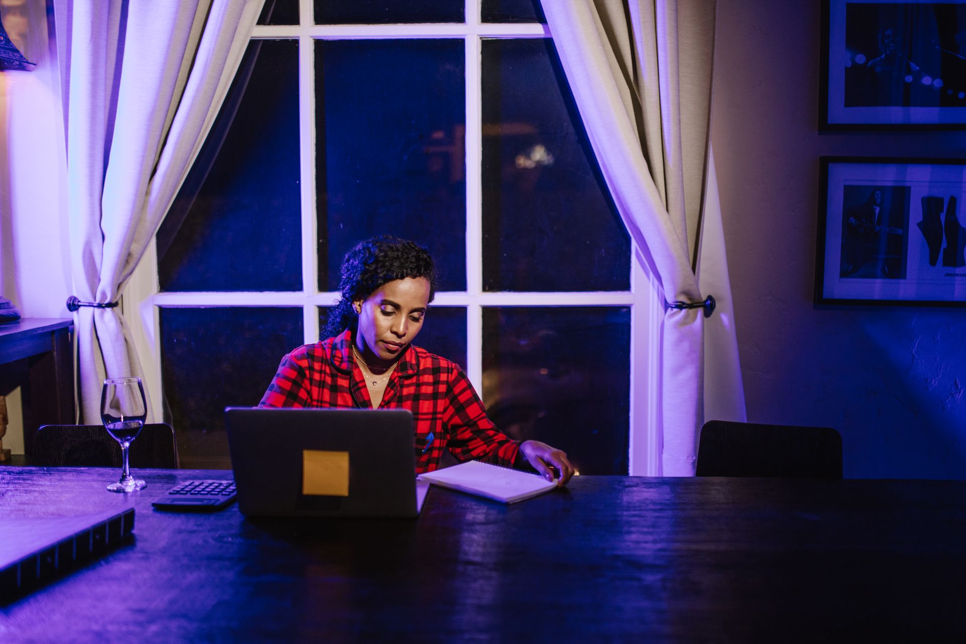 Desk with a laptop at night
